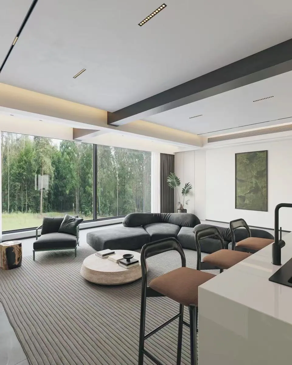 Open living and dining space with full-height windows