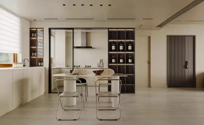 Modern kitchen with glass partition and dining table