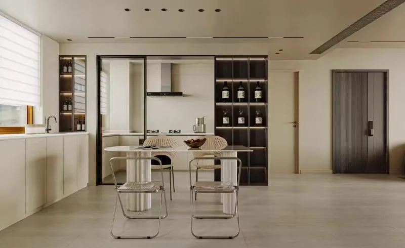 Modern kitchen with glass partition and dining table
