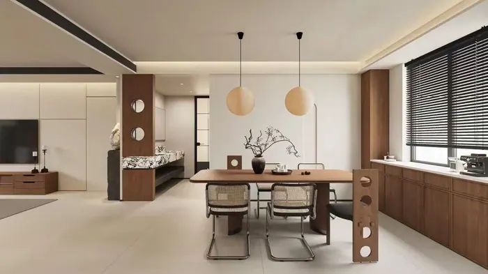 Dining area with wood kitchen cabinetry