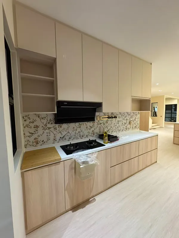 Wood-grain and cream custom kitchen — Johor Bahru condo
