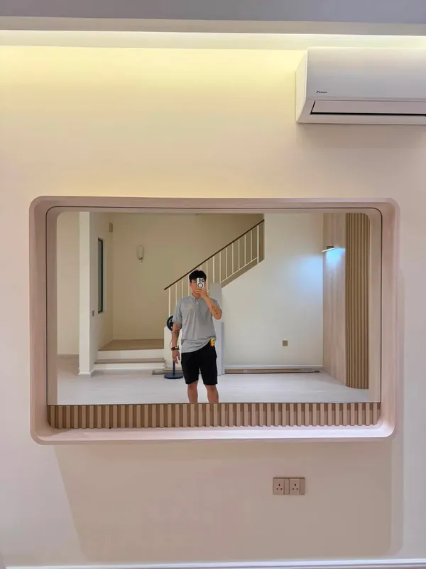 Curved pass-through window and fluted feature wall — recent Johor Bahru project
