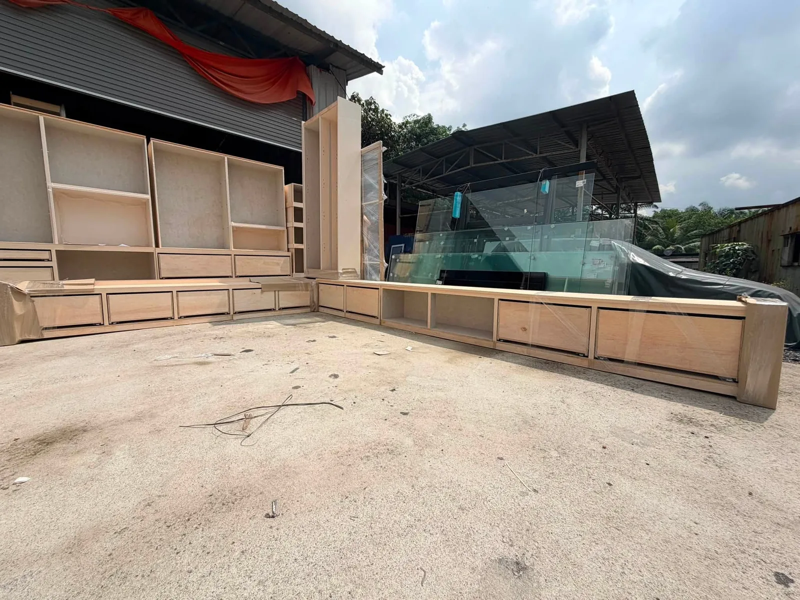 In our Johor Bahru workshop — the plywood carcasses before laminate and installation